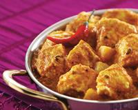 Curry de poulet en sauce et pommes de terre