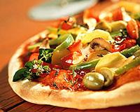 Pizza aux légumes et au jambon