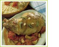 Gigot d'agneau aux tomates, ail et spaghettis